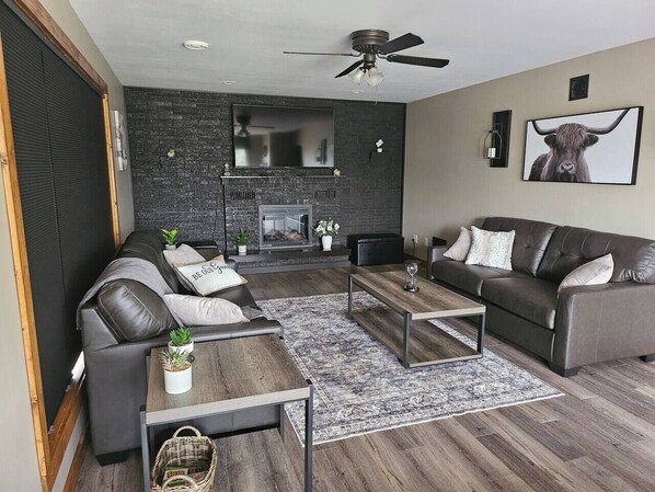 Smart TV, fireplace, foosball, books