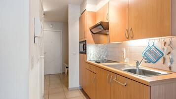 Apartment | Private kitchen | Electric kettle, toaster, high chair