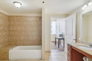 Hair dryer, towels, shampoo, toilet paper