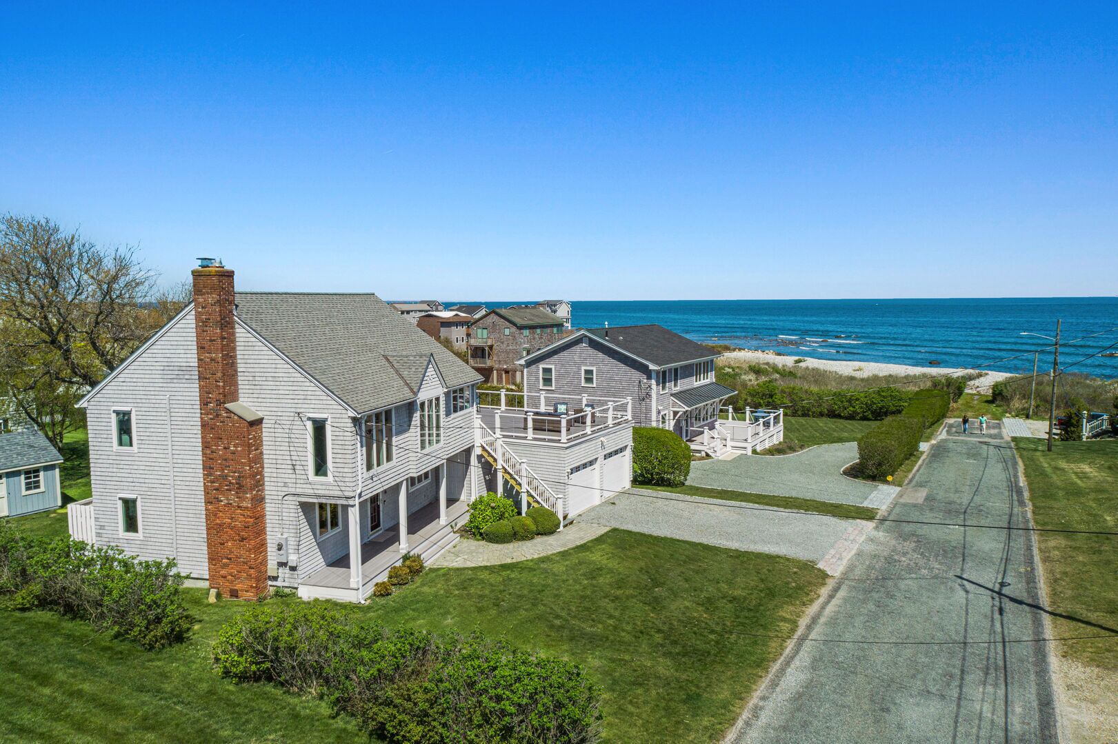 Spectacular beach home, rooftop deck w/ lovely ocean views, walk to water&more!