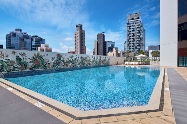 Seasonal outdoor pool, pool umbrellas, sun loungers