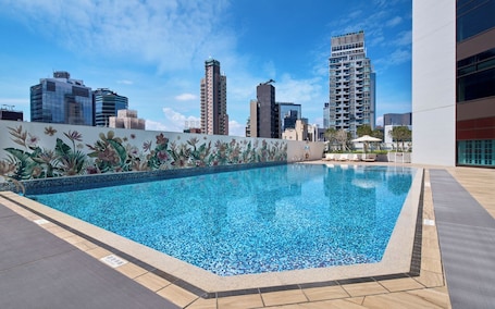Seasonal outdoor pool, pool umbrellas, sun loungers