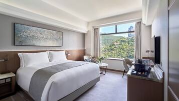 1 habitación, cubrecamas, minibar y caja de seguridad en la habitación