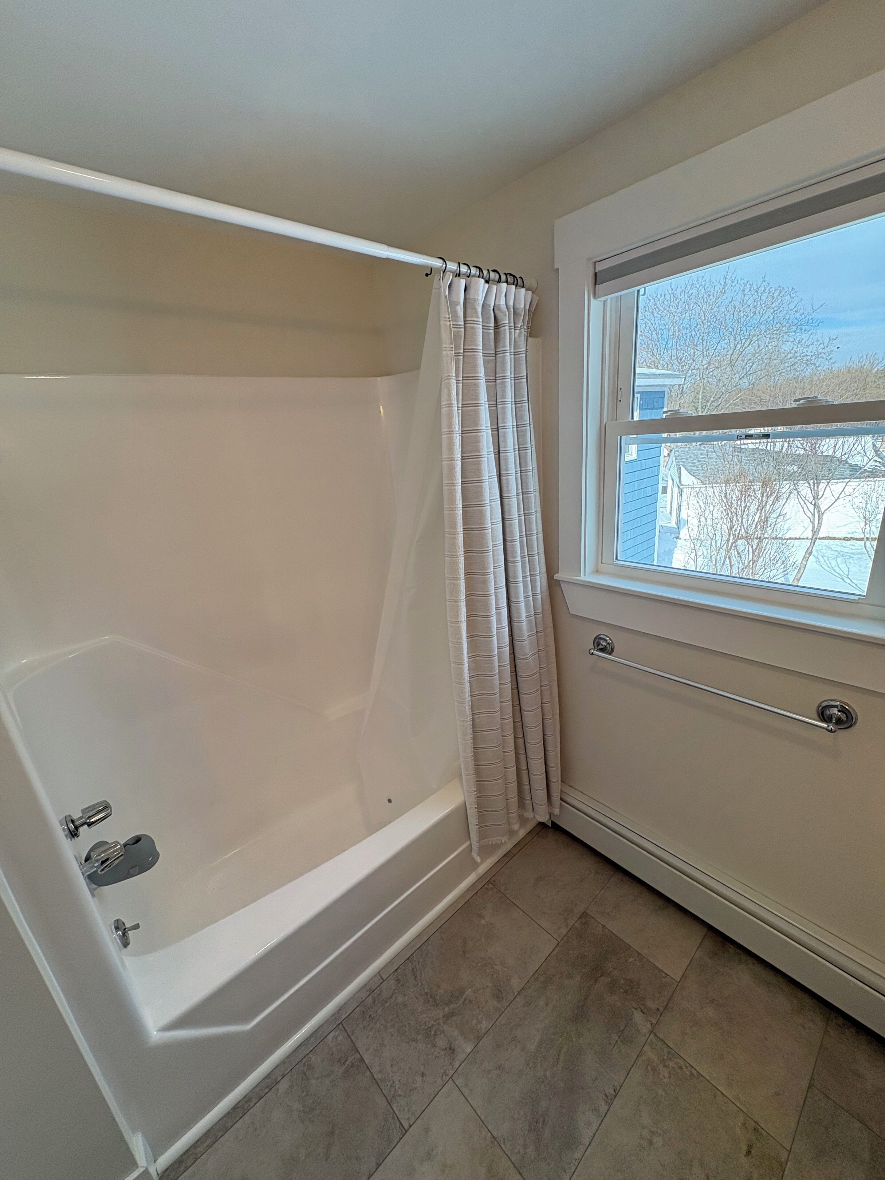 Upstairs bathroom with a full tub/ shower