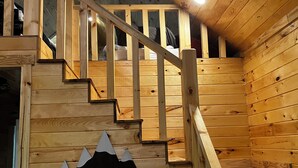 A wooden staircase with a handrail leading to a higher level. - The LucKY Lodge: Hot Tub! New Build, 11 Miles to Natural Bridge (Campton)