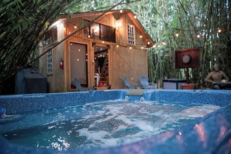 Outdoor spa tub. HW Tiny Home Cidra