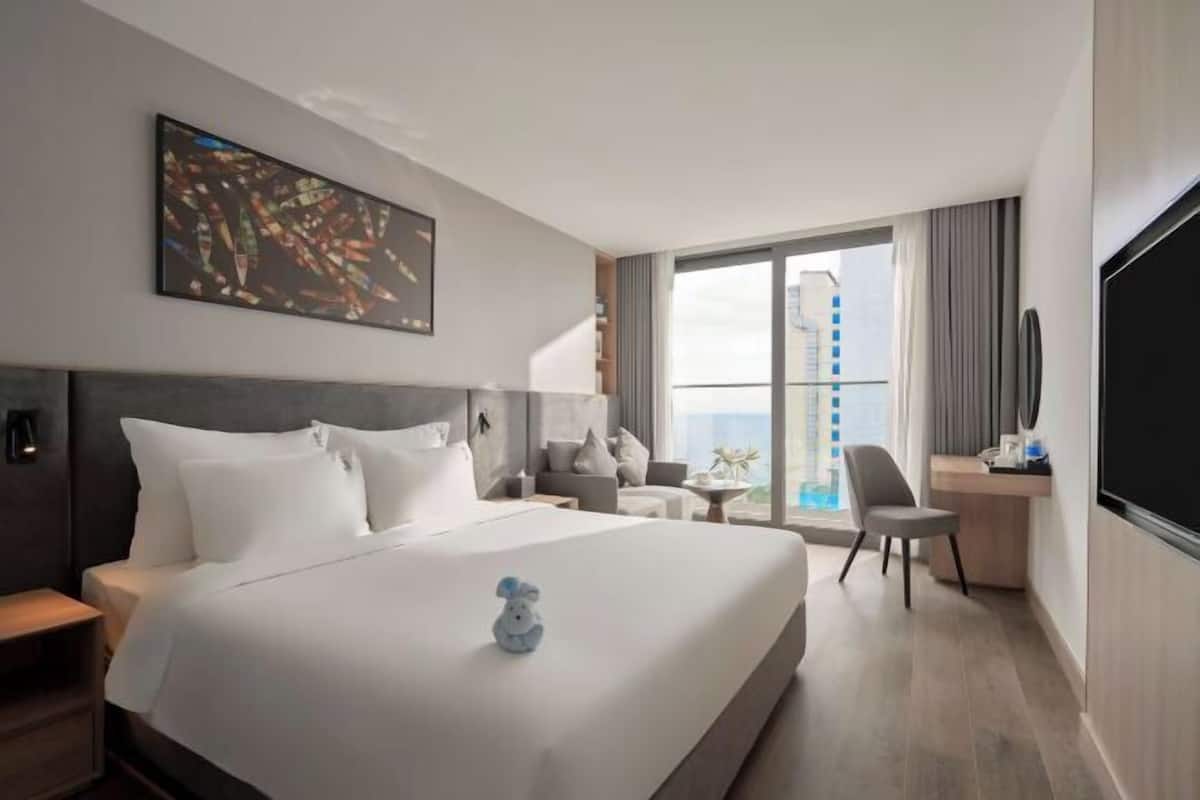 Premium bedding, down duvets, in-room safe, desk