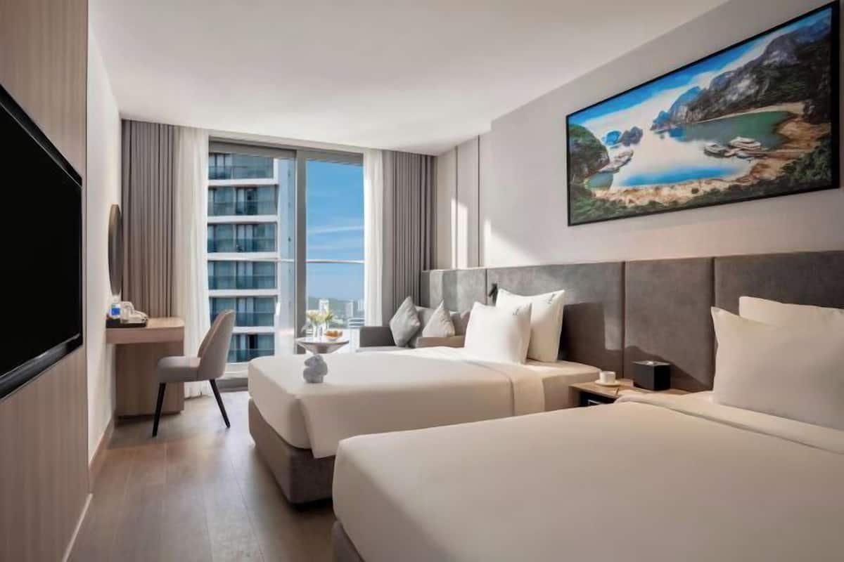 Premium bedding, down duvets, in-room safe, desk