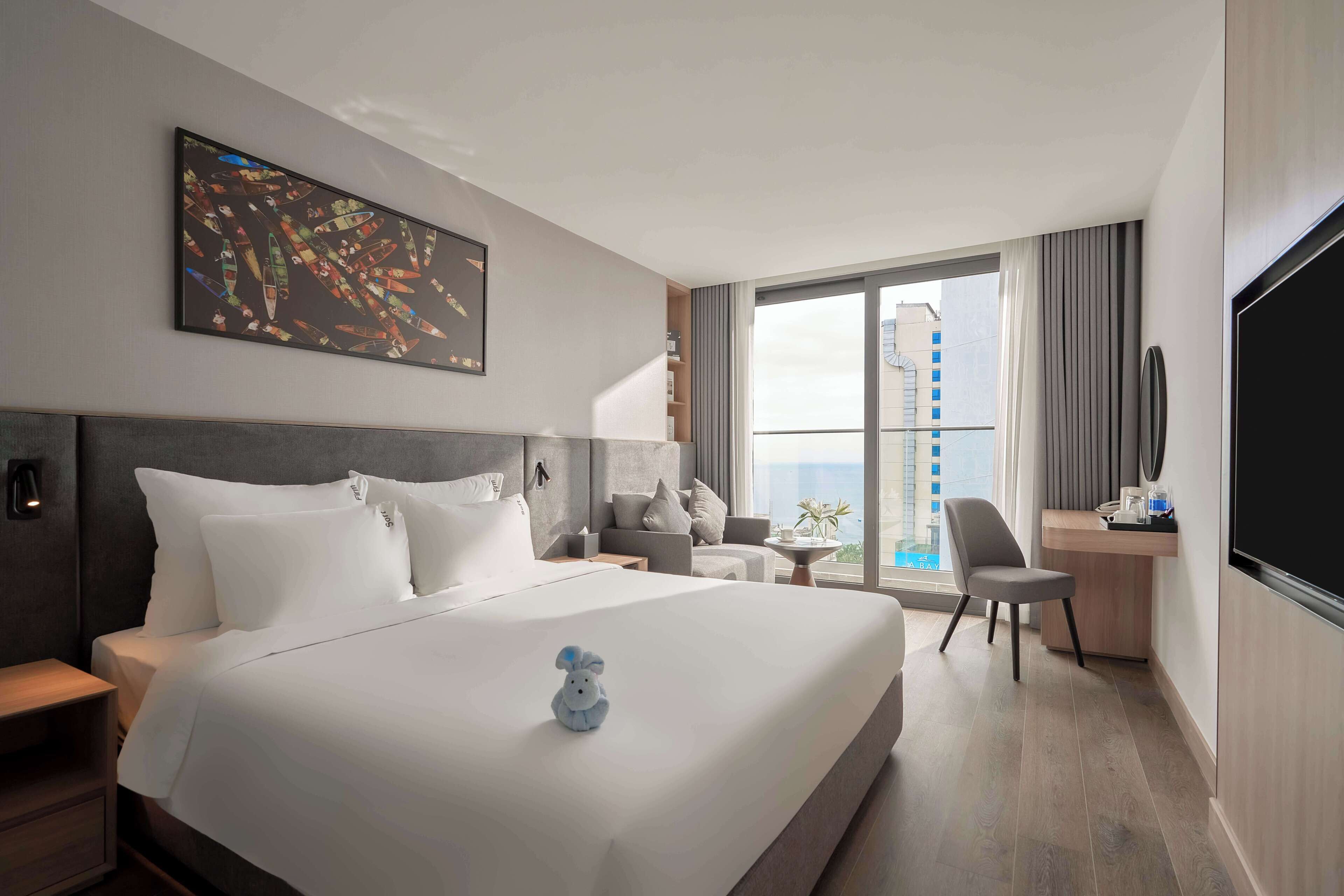 ห้องพรีเมียร์ดับเบิล, ระเบียง, วิวทะเล | เครื่องนอนระดับพรีเมียม, ผ้านวมขนเ  ป็ด, ตู้นิรภัยในห้องพัก, โต๊ะทำงาน