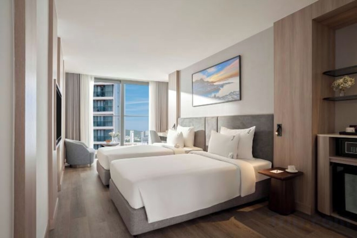 Premium bedding, down duvets, in-room safe, desk