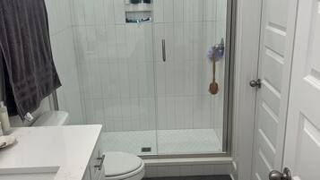 Shower, towels, soap, shampoo