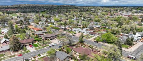 An aerial view of a residential neighborhood with houses, streets, and greenery.