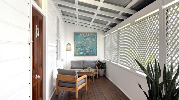 A cozy porch with a wooden bench, a cushioned chair, and a table with a potted plant. - Heritage 5BR Queenslander - Minutes walk to CBD & South Bank (Highgate Hill)