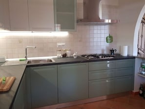 Apartment | Private kitchen | Oven, highchair - Holiday Home Casa Solaria (Sinnai)
