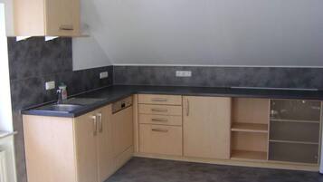 Apartment | Private kitchen | Oven, electric kettle, toaster