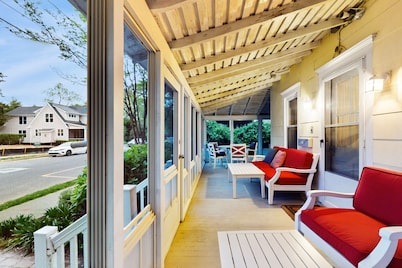 Dog-friendly 2-story home near beach with screened porch, fast WiFi, W/D, & AC
