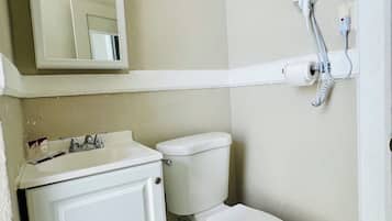 Hair dryer, towels, soap, shampoo