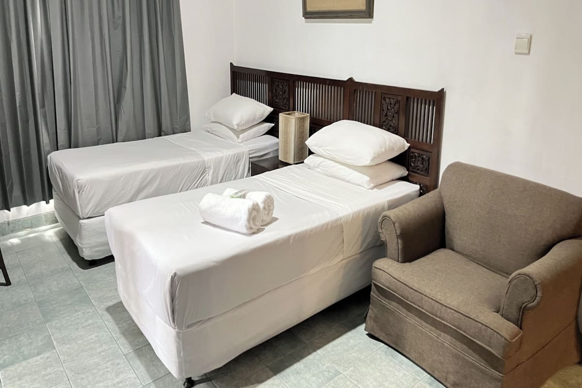 Habitación Deluxe | Escritorio, wifi gratis y ropa de cama