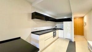 Private kitchen - Belvilla by OYO Apto con Piscina en Vera Playa (Vera)