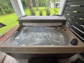Outdoor spa tub - Beautiful luxurious executive home located eight minutes from beach and golf.  (Mount Pleasant)