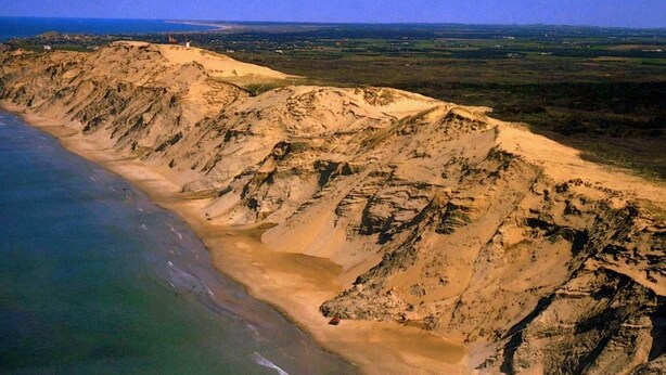 A coastal landscape with a beach and cliffs. - 4 Star Holiday Home in Hjorring (Hjørring)