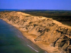 A coastal landscape with a beach and cliffs. - 4 Star Holiday Home in Hjorring (Hjørring)