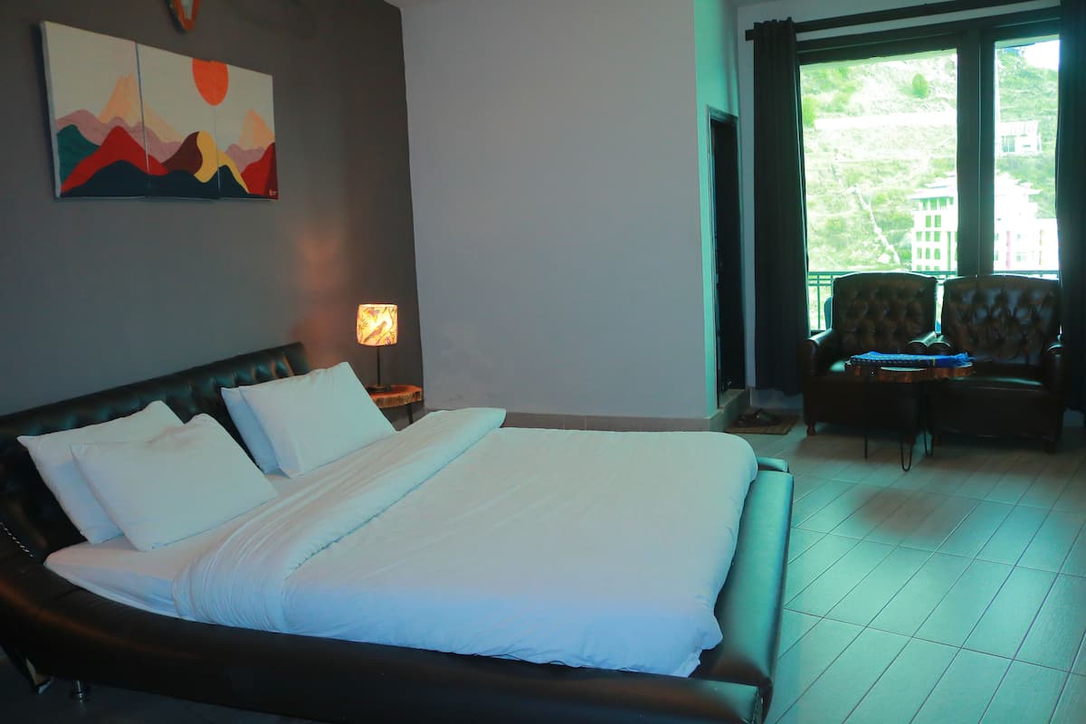 Habitación Deluxe | 1 dormitorio y ropa de cama