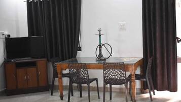 2BHK Villa With Garden View | Living area | 32-inch LED TV with digital channels