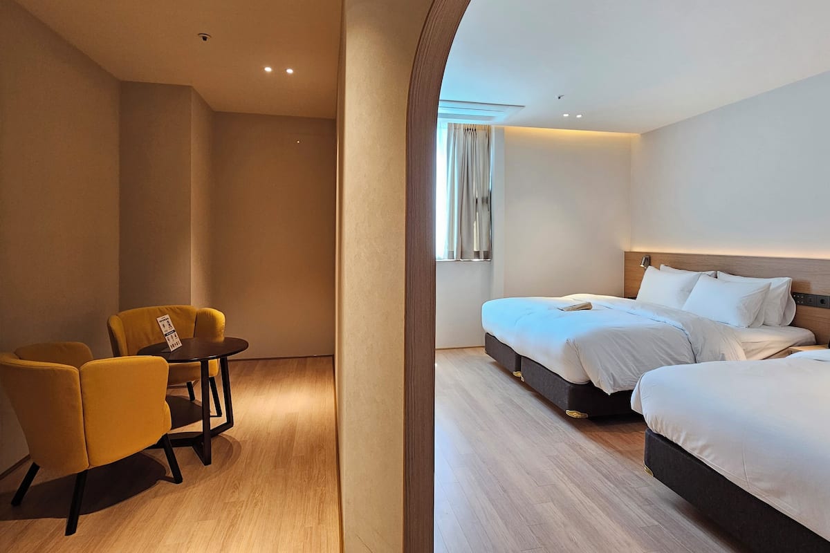 Signature Twin kamer | 1 slaapkamer, donsdekens, een gratis minibar, geluiddichte muren