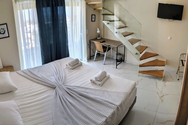 Family Suite, Balcony, Beach View | Desk, laptop workspace, soundproofing, free WiFi