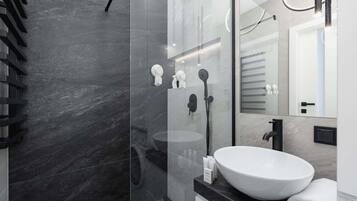 Shower, hair dryer, towels, shampoo