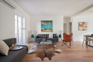 Apartment, 3 Bedrooms | Living room | Flat-screen TV