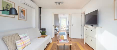 Apartment, 2 Bedrooms | Living room | Flat-screen TV