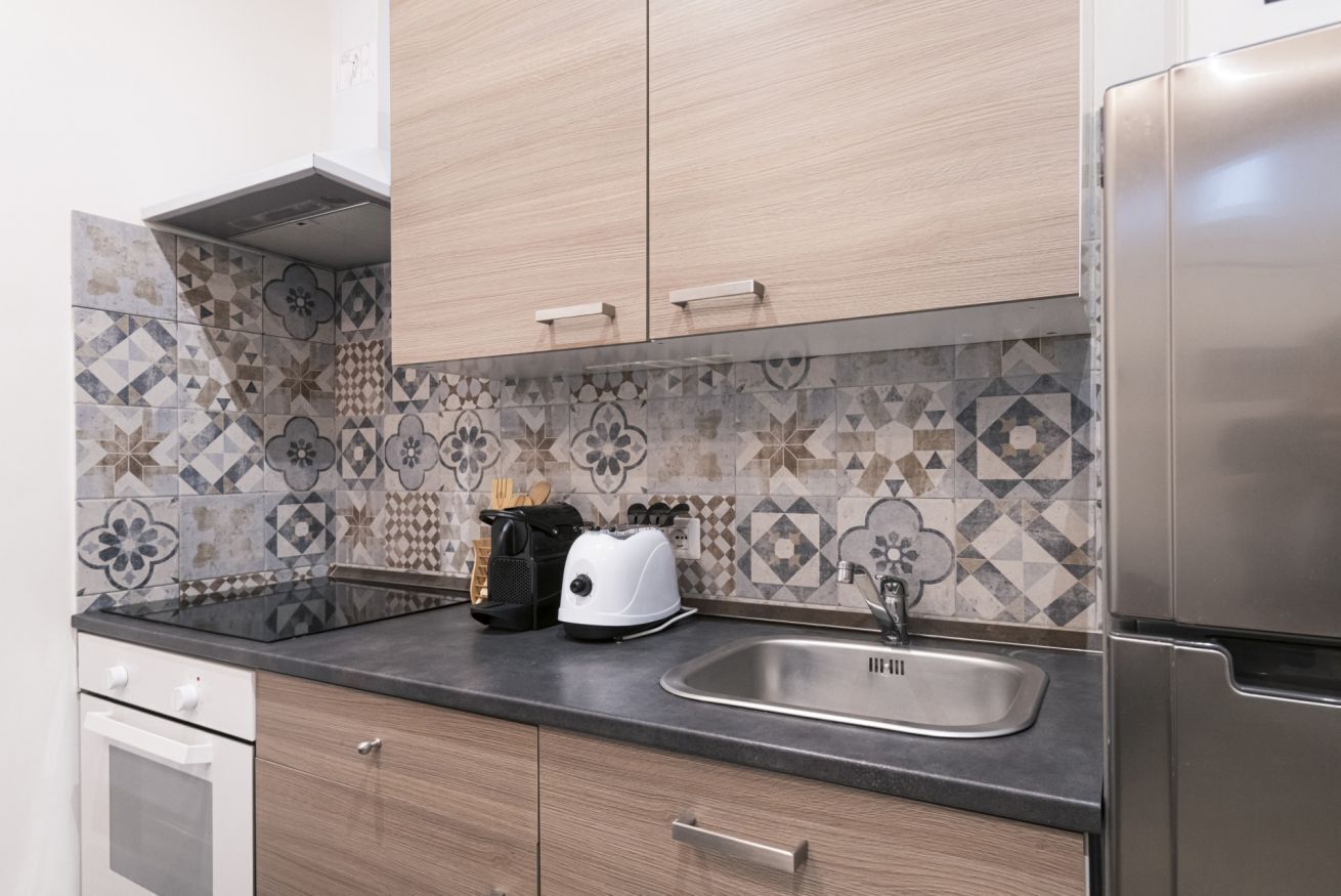 Frigorifero, microonde, forno, piano cottura