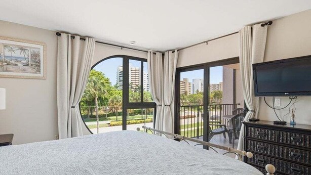 Unclassified image, 1 of 13, button - 2BR, 2BA Marco Island condo with heated pool, WiFi, and full kitchen. (Marco Island)