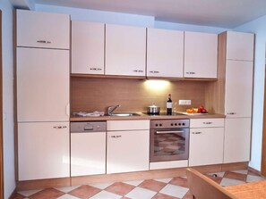 Apartment | Private kitchen | Oven, electric kettle, toaster