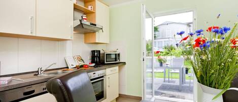 Apartment | Private kitchen | Oven, electric kettle, toaster