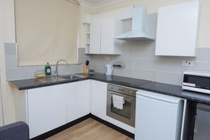 Apartment | Private kitchen | Fridge, microwave, oven, stovetop