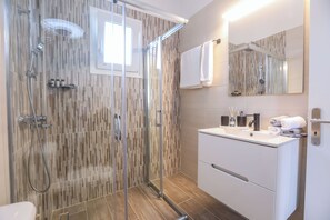 Hair dryer, towels, soap, shampoo