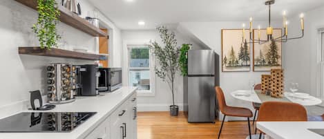 Fridge, microwave, stovetop, coffee/tea maker