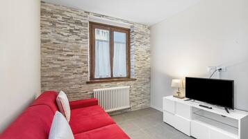 Standard Apartment, 1 Bedroom (Appartamento 30 NODI Torbole) | Living area | Flat-screen TV