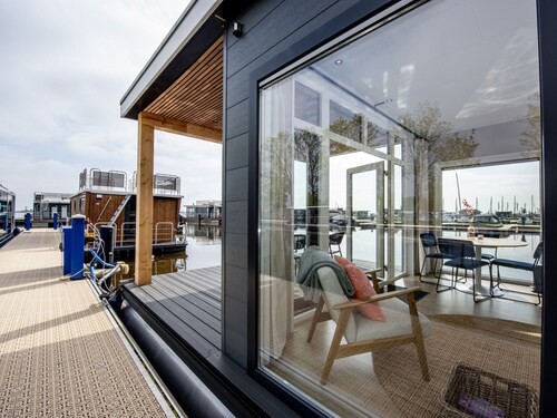 Modern Houseboat With View of the Lake