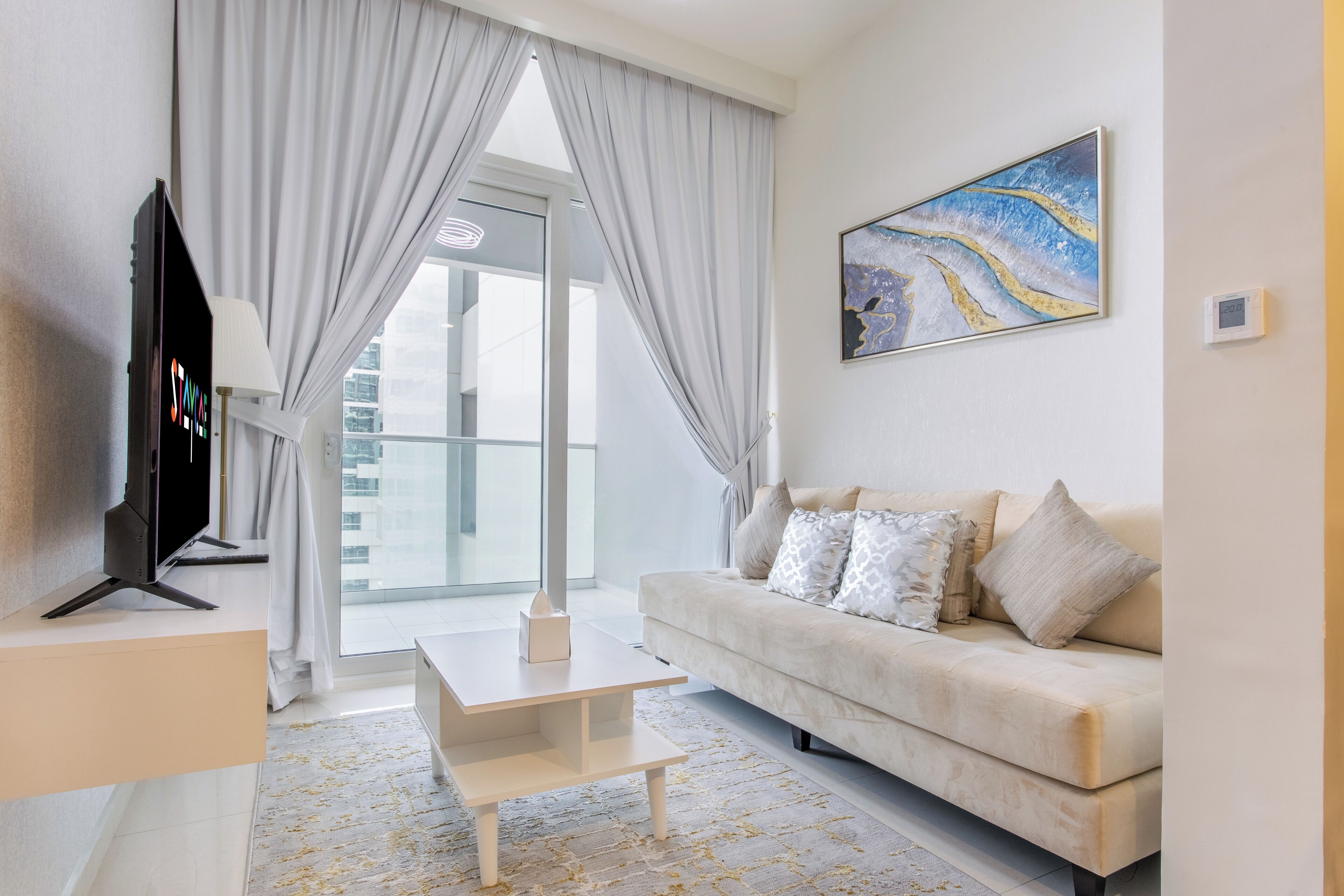 Luxury Apartment | Living area | 40-inch flat-screen TV with cable channels