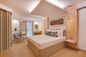 Chambre exĂ©cutive | SystĂšme dâinsonorisation, fer et planche Ă repasser