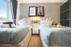 3 bedrooms, desk, iron/ironing board, travel cot
