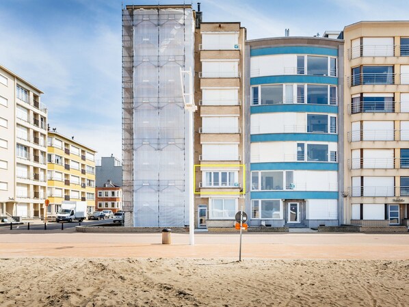 A multi-story building with a modern architectural design, featuring a mix of balconies and large windows. - Apartment Near Belgian Coast With Sea View (Koksijde)