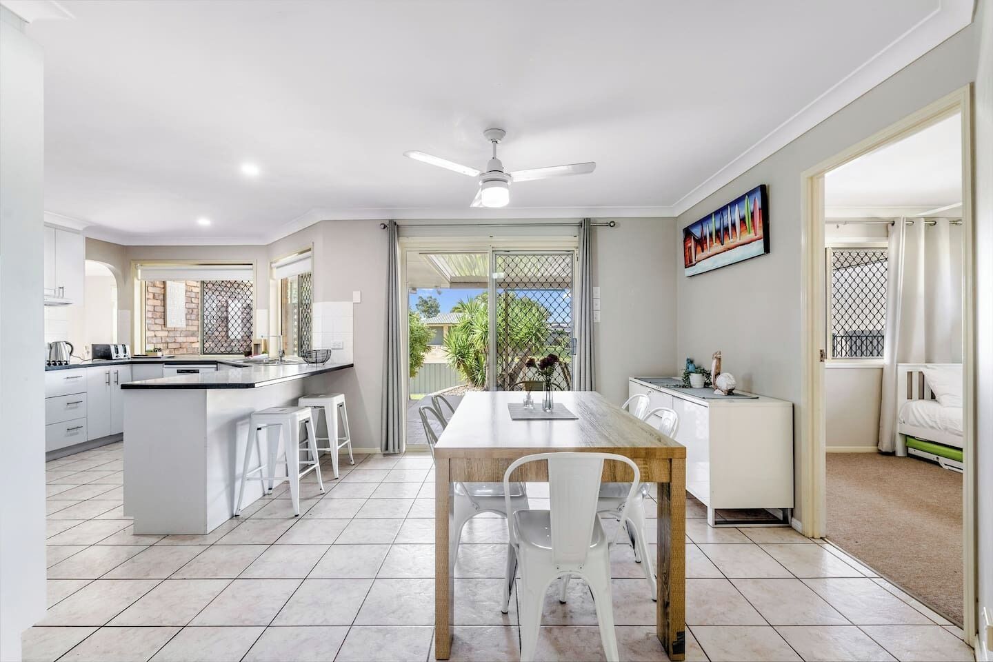 Share a meal around the dining table or take things slow up at the breakfast bar.
