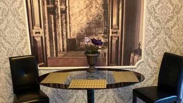 Standard Studio | Living area | 17-inch flat-screen TV with cable channels