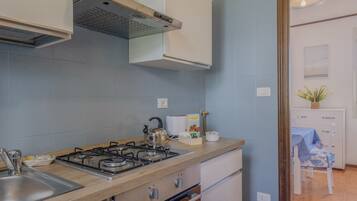 Apartamento | Cozinha privada | Cooktop