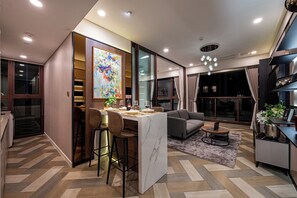 Apartamento empresarial | Área de estar